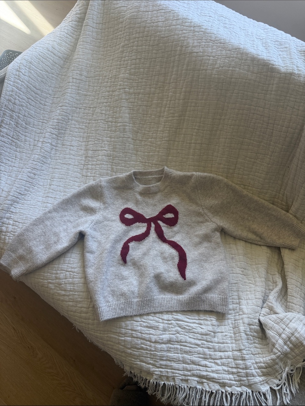 Light tan Sweater with Burgundy red Bow Graphic